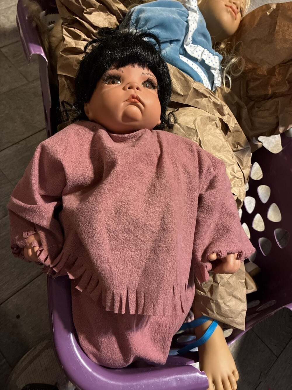 Vintage Porcelain Toddler Doll with Black Hair and Mauve Fringed Poncho